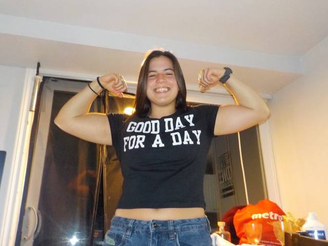 Fan flexing in a Tight Five tee